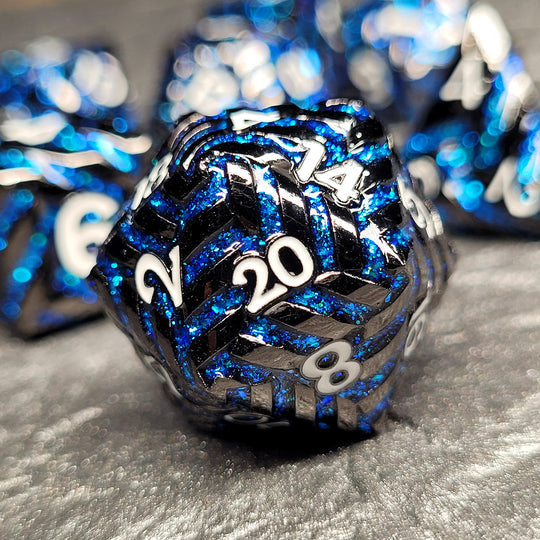 Cosmic Energy Gunmetal Blue Metal RPG Dice Set of 7 | Grognard Games