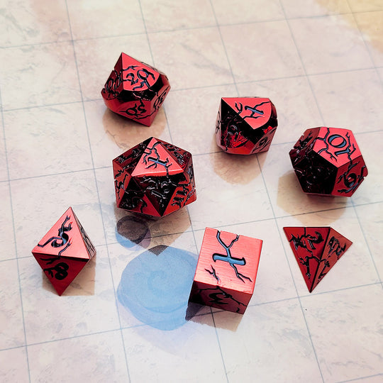 Forged Gaming Cracked Red with Black Enamel Set of 7 Metal Dice Set | Grognard Games