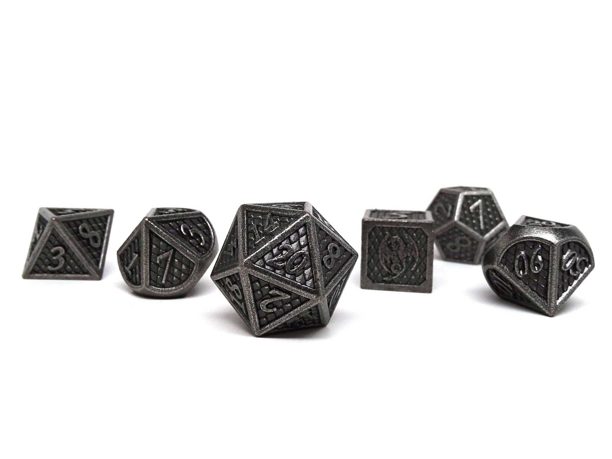 Easy Roller Dice 7 piece dice collection - Dragon scale metal dice - Bordered silver dragon scales | Grognard Games