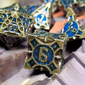Arcane Enigma Gold Blue Metal RPG Dice Set | Grognard Games