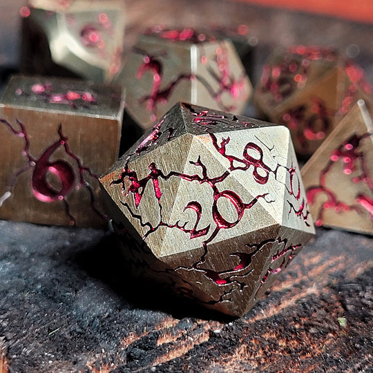 Forged Gaming Cracked Brushed Gold with Red Foil 7-Piece Metal Dice Set | Grognard Games