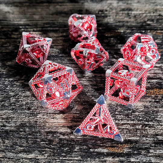 Old School Dice and Accessories Deep Dreamer Silver Red Hollow Metal RPG Dice Set | Grognard Games