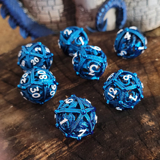 Old School Dice and Accessories Dragons Bauble Blue Hollow Metal RPG Dice Set | Grognard Games