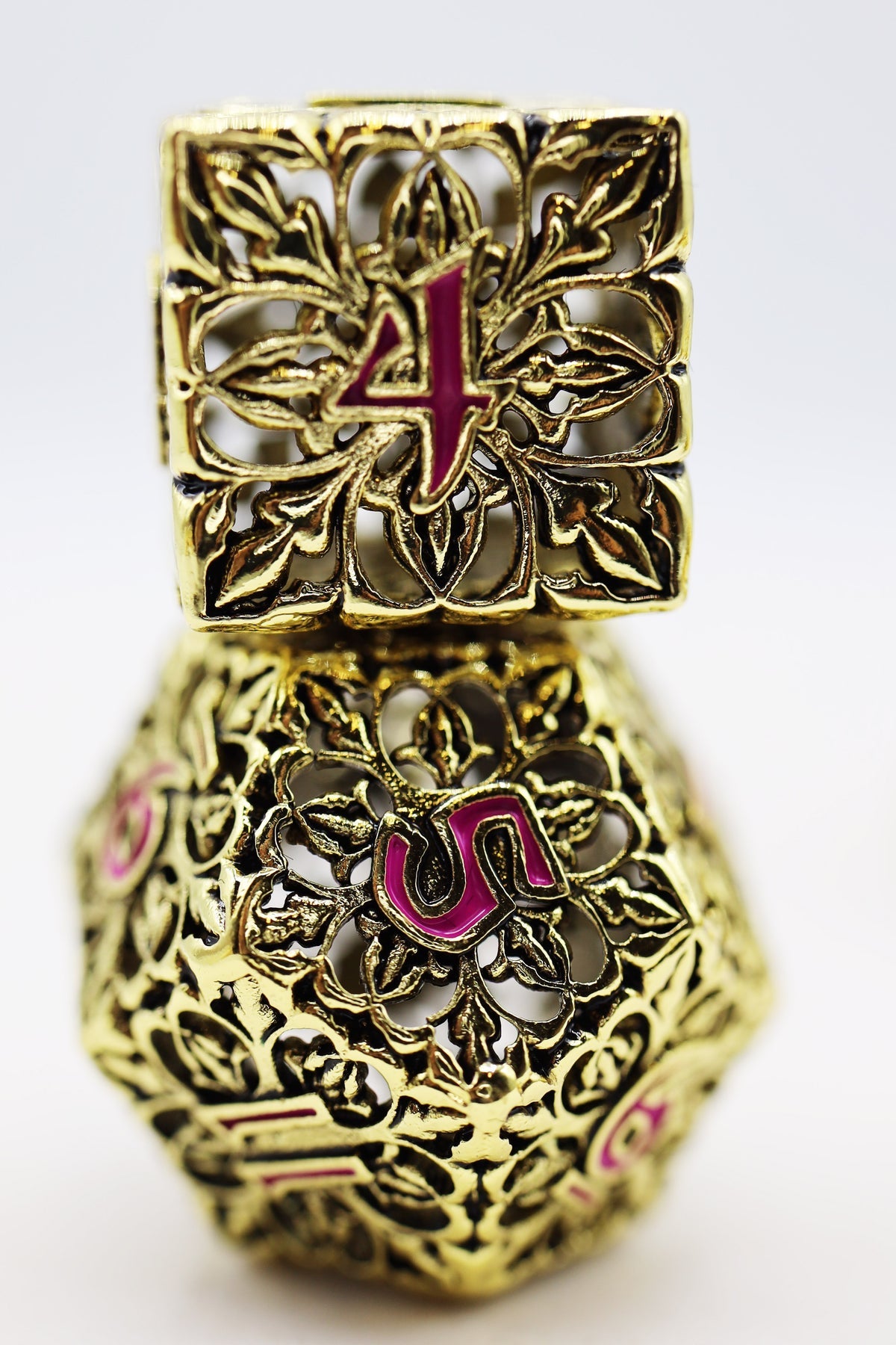 Fleur De Lis: Gilded Magenta Hollow RPG Metal Dice Set | Grognard Games